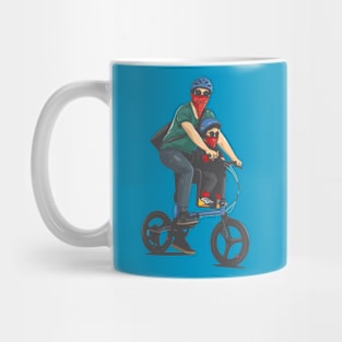 father and son ride bicycle Mug